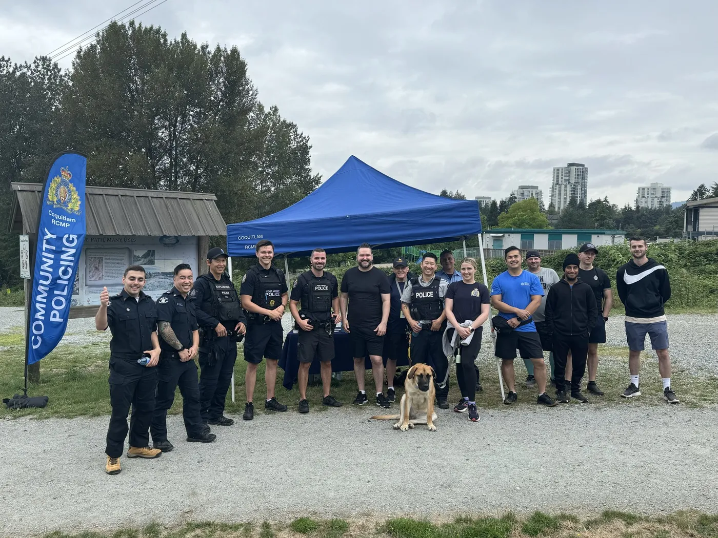 Callan Morrison with volunteers at a Port Moody community tent.